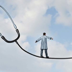 A businessman in a doctor coat walking on a medical stethoscope
